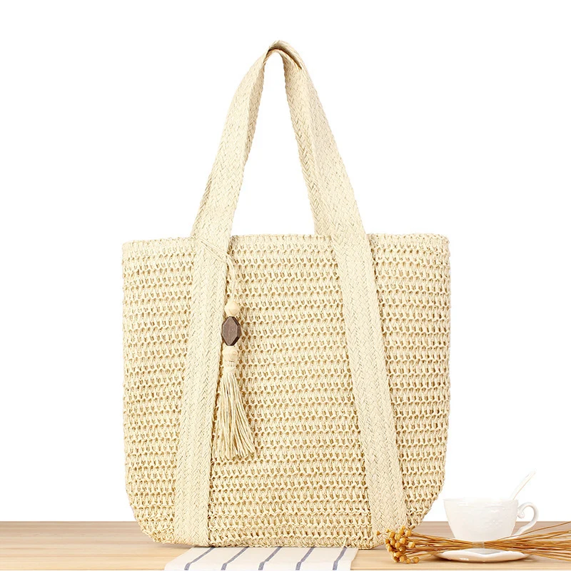 Umweltfreundliche Raffia-Einkaufstasche mit elegantem Quasten-Detail Skanto