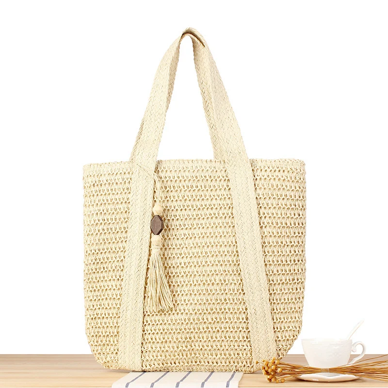 Umweltfreundliche Raffia-Einkaufstasche mit elegantem Quasten-Detail Skanto