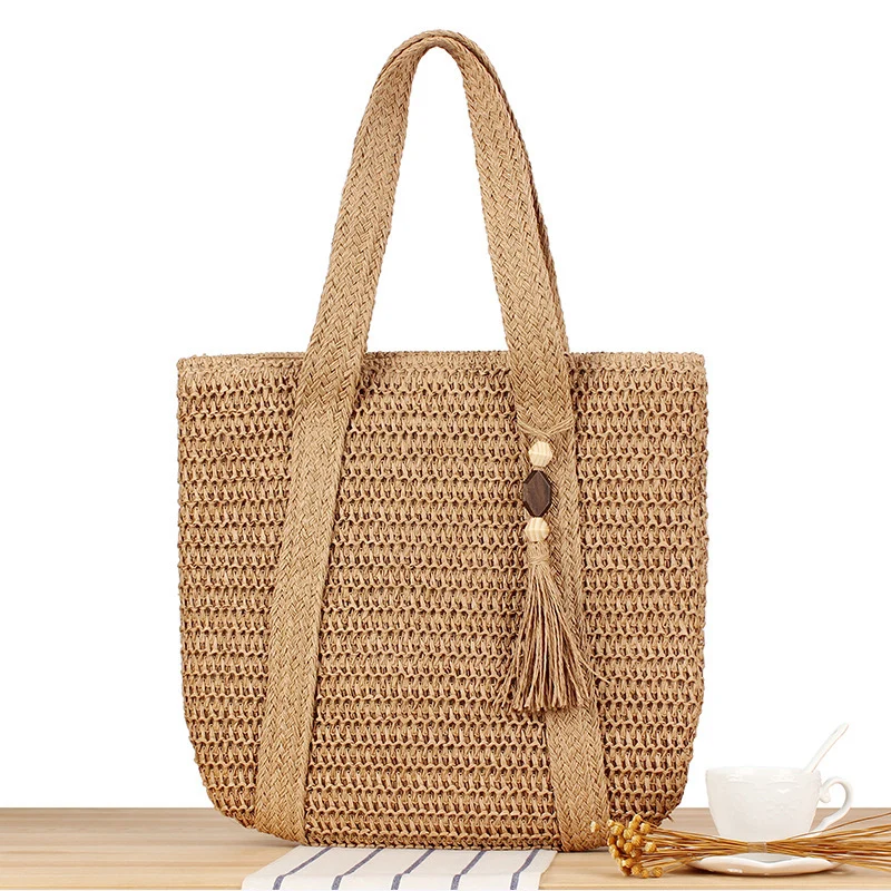 Umweltfreundliche Raffia-Einkaufstasche mit elegantem Quasten-Detail Skanto