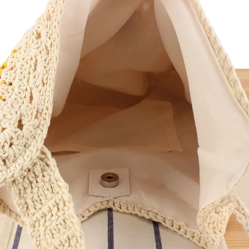 Handgeknüpfte Tragetaschen mit floralen Häkelmustern Skanto