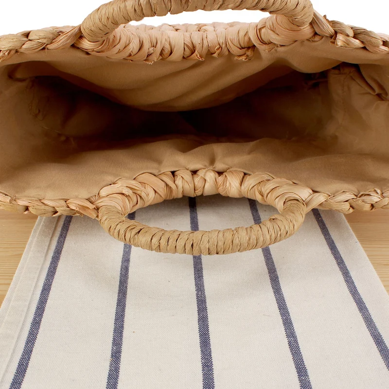 Handtasche aus handgefertigtem Naturmaterial mit elegantem Rundgriff Skanto