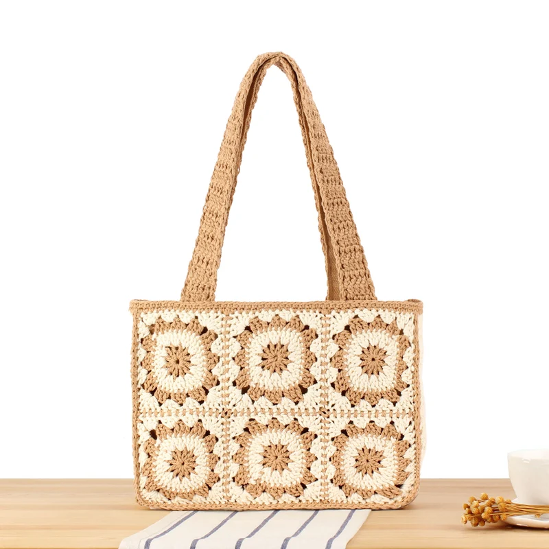 Moderne Häkelhandtasche mit einzigartigem Blumendesign Skanto