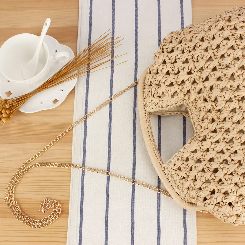 Handtasche aus natürlich beschichtetem Flechtmaterial mit elegantem Kettendetail Skanto