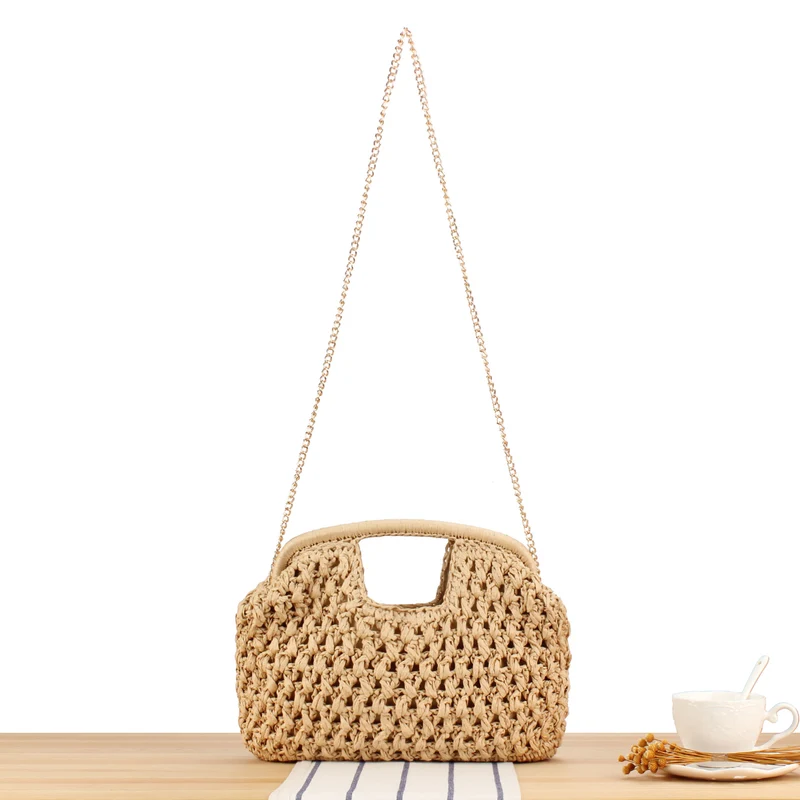 Handtasche aus natürlich beschichtetem Flechtmaterial mit elegantem Kettendetail Skanto