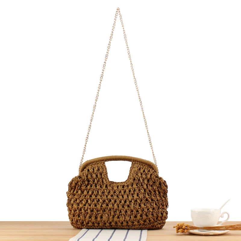 Handtasche aus natürlich beschichtetem Flechtmaterial mit elegantem Kettendetail Skanto