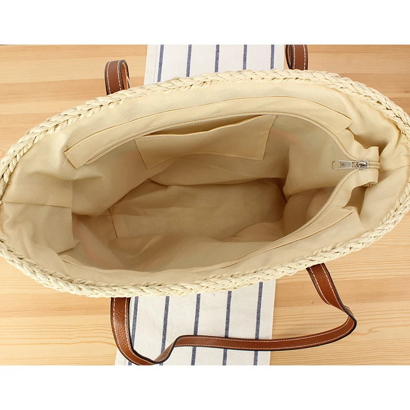 Freizeit-Strandtasche aus gewebtem Naturmaterial mit farbenfroher Dekoration Skanto