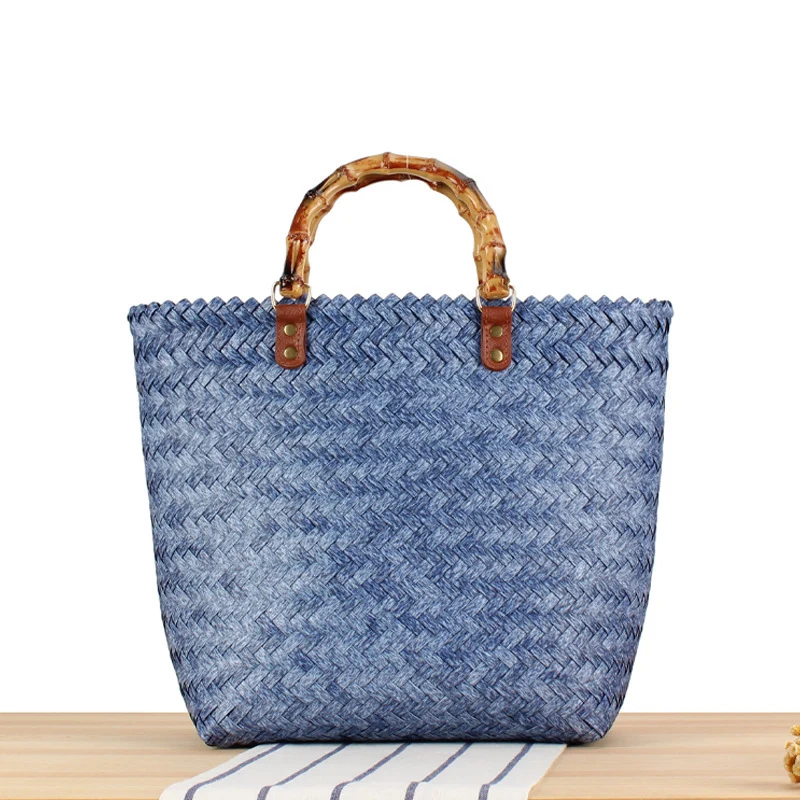 Handtasche aus hochwertigem, geflochtenem Material mit Bambusgriff Skanto