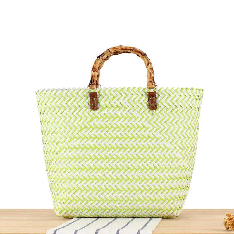Handtasche aus hochwertigem, geflochtenem Material mit Bambusgriff Skanto