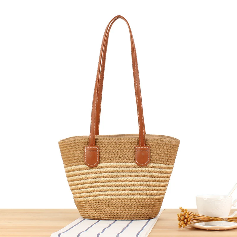 Handtasche aus hochwertigem Bast mit eleganten Ledergriffen Skanto