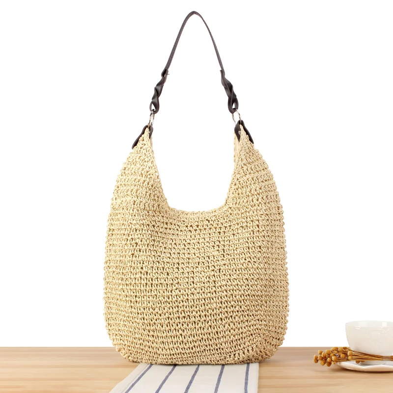 Handtasche aus handgefertigtem Naturgeflecht mit elegantem Schulterriemen Skanto