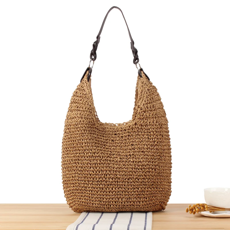 Handtasche aus handgefertigtem Naturgeflecht mit elegantem Schulterriemen Skanto