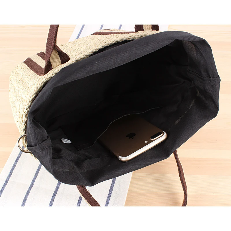 Handtasche aus geflochtenem Naturmaterial mit abnehmbarem Lederriemen Skanto