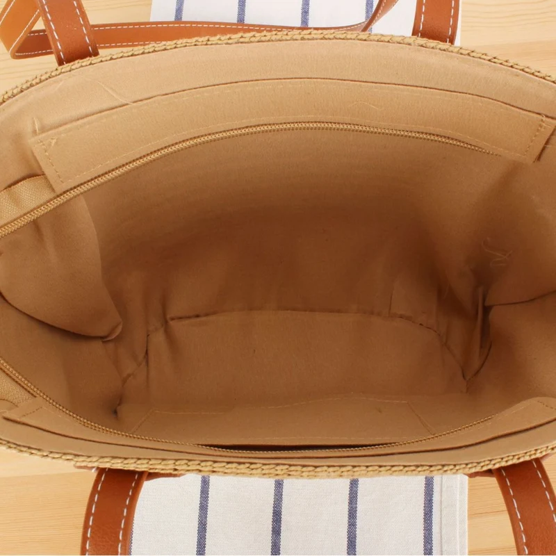 Strandtasche mit stilvollem Flechtdesign und hochwertigem Kunstledergriff Skanto