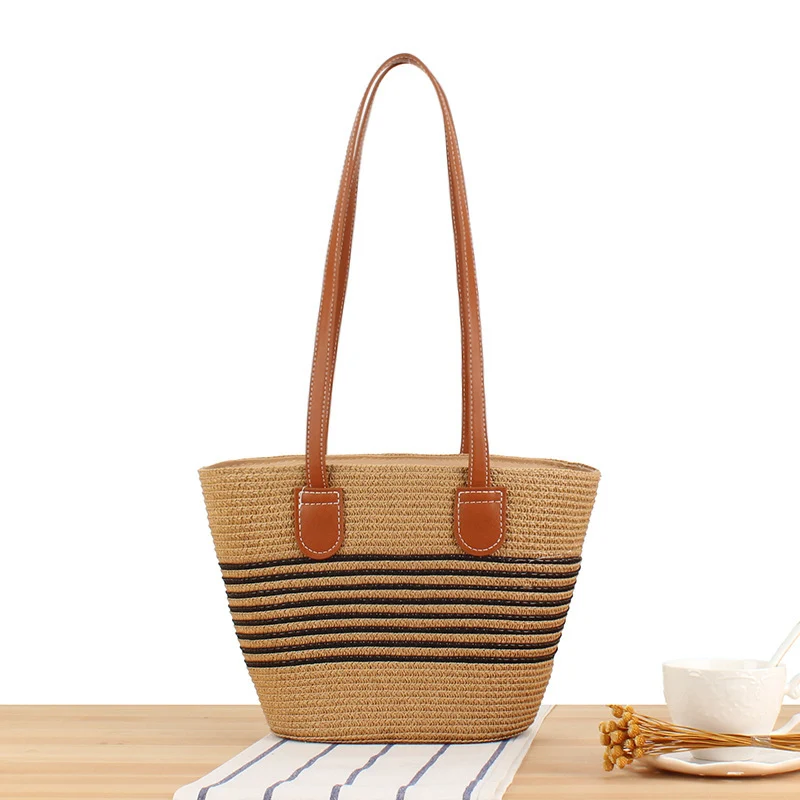 Strandtasche mit stilvollem Flechtdesign und hochwertigem Kunstledergriff Skanto