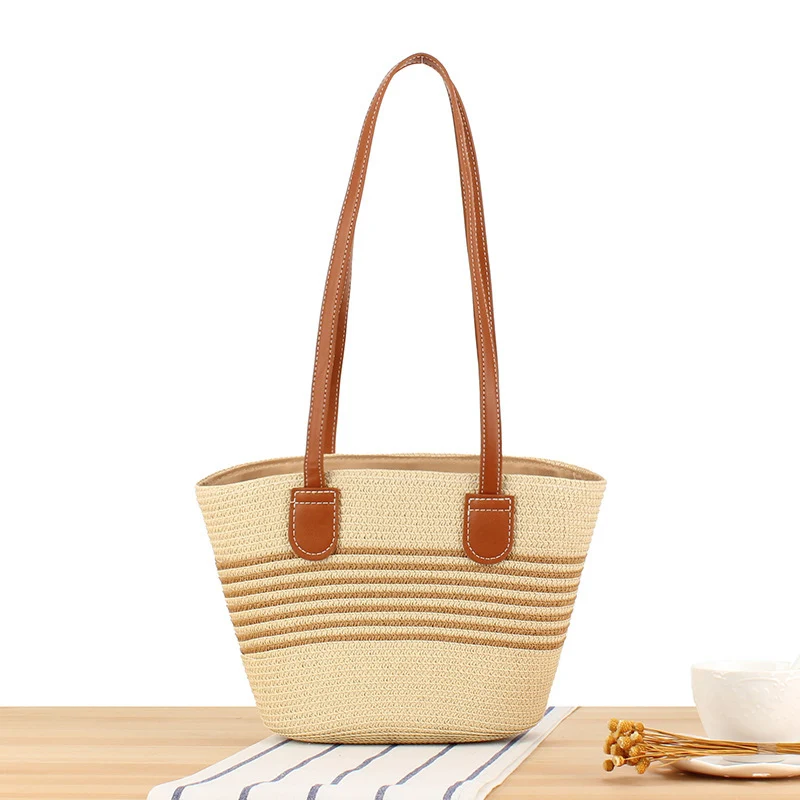 Strandtasche mit stilvollem Flechtdesign und hochwertigem Kunstledergriff Skanto