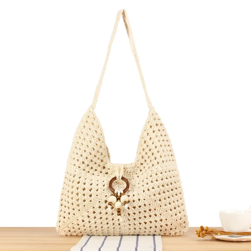 Handtasche aus handgeknüpftem Naturmaterial mit stilvollen Fransen-Details Skanto