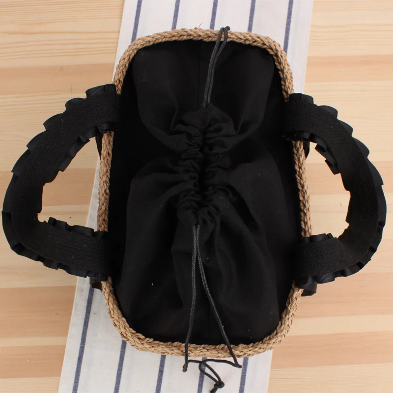Geflochtene Handtasche mit eleganten Griffen Skanto