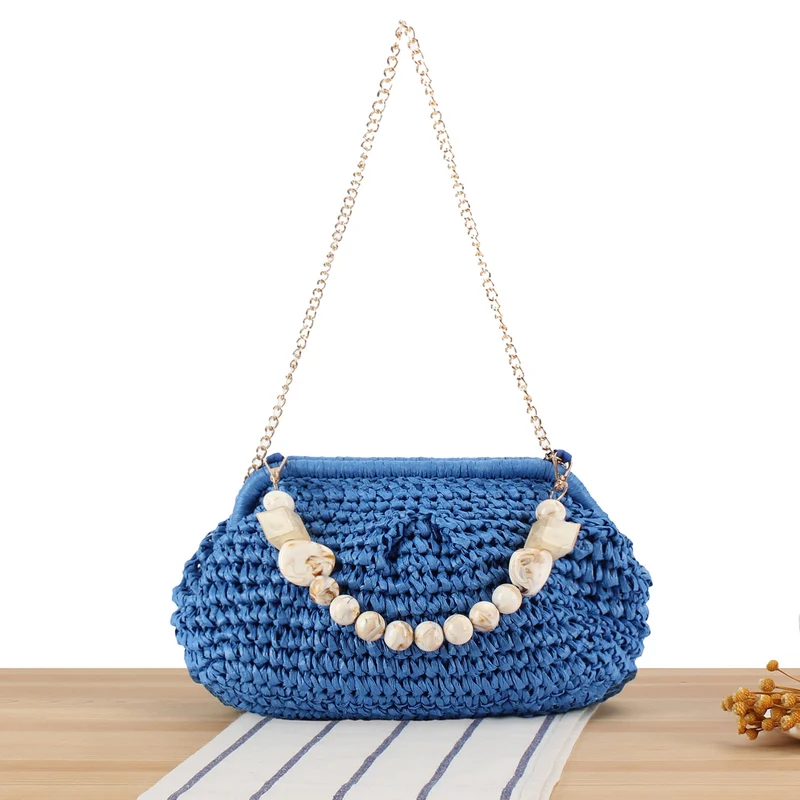 Geflochtene Clutch mit Perlenakzent Skanto