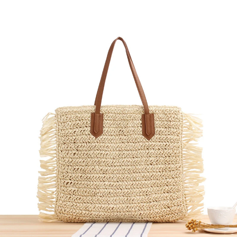 Strandtasche mit Fransen und robusten Ledergriffen Skanto