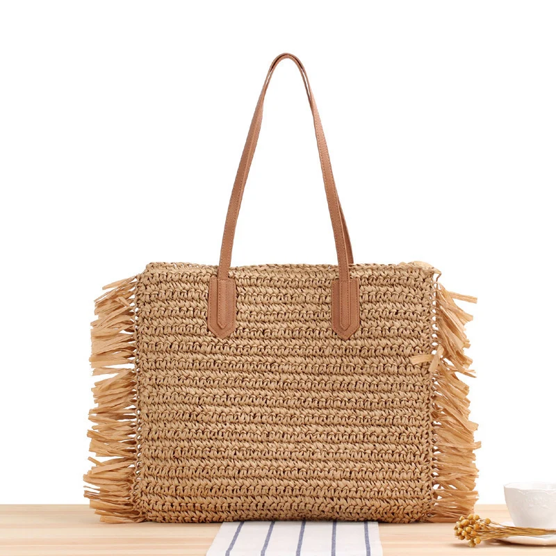 Strandtasche mit Fransen und robusten Ledergriffen Skanto