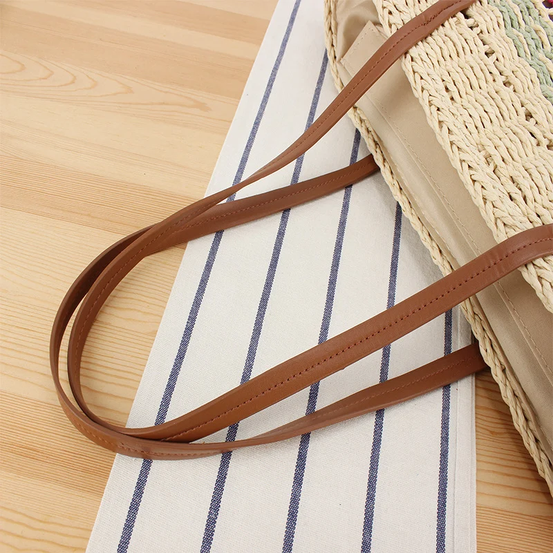 Geflochtene Strohtasche mit Ledergriff Skanto