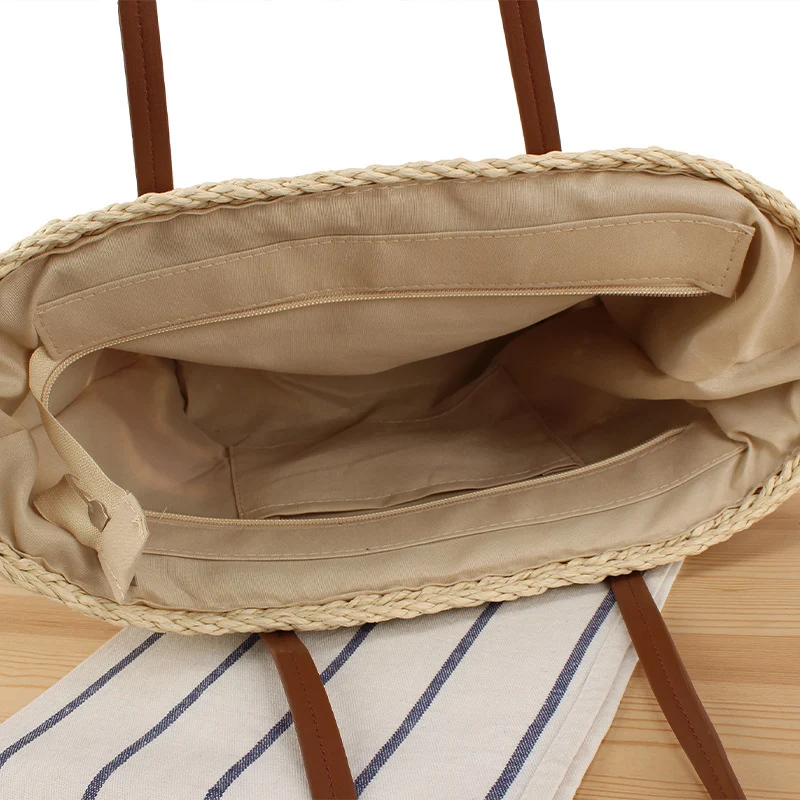Geflochtene Strohtasche mit Ledergriff Skanto