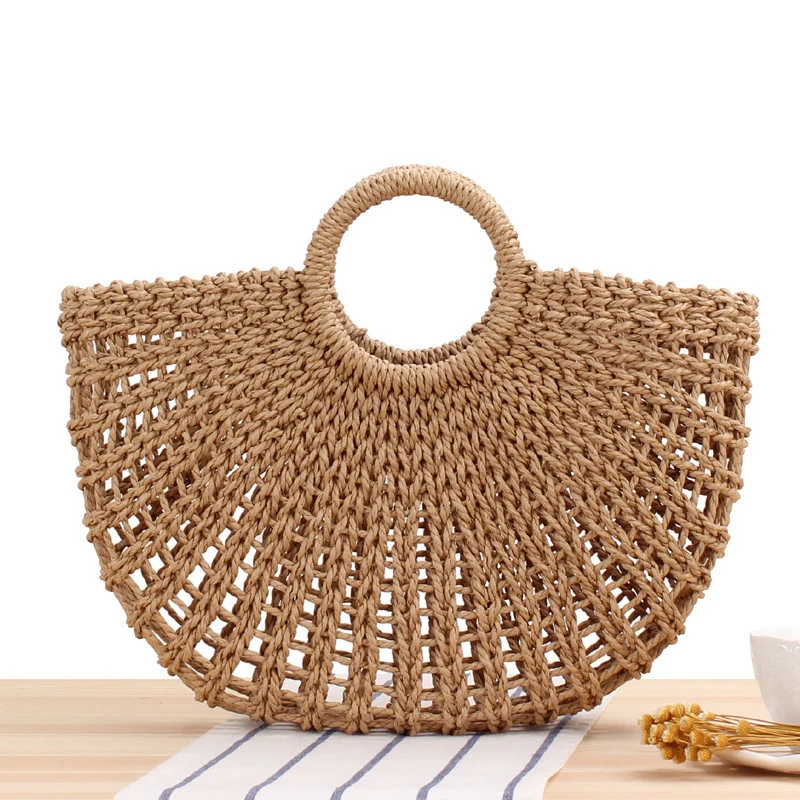 Filigrane Raffia-Umhängetasche mit runden Holzgriffen Skanto
