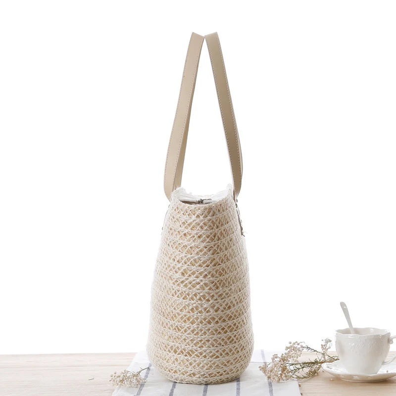 Strohtasche aus geflochtenem Material mit eleganter Schleifendekoration Skanto