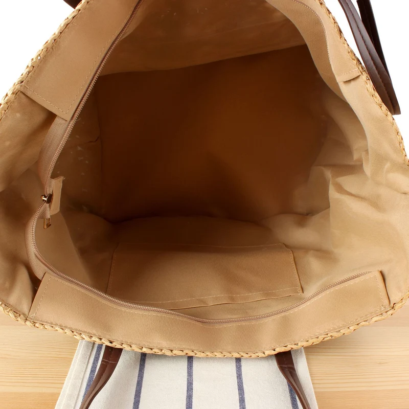 Designer-Korbtasche mit eleganten Ledergriffen Skanto