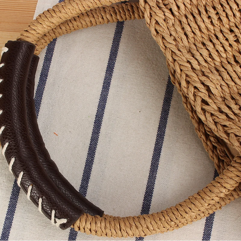 Korbtasche aus geflochtenem Naturmaterial mit Ledergriffen Skanto