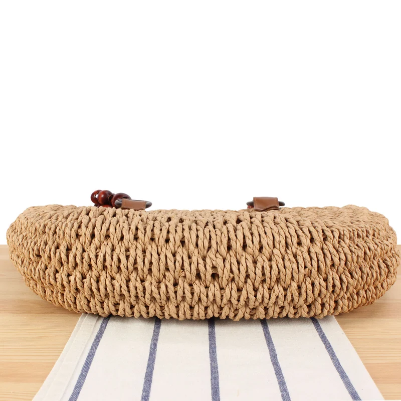 Handtasche mit dekorativen Holzperlen und Naturgeflecht Skanto