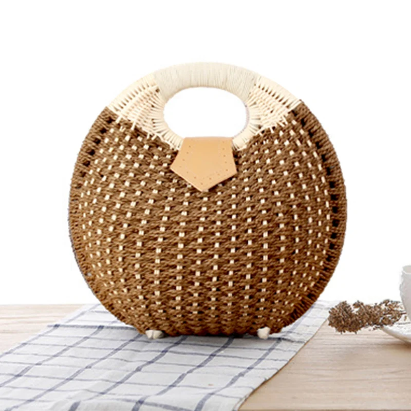 Runde Strohtasche mit elegantem Ledergriff Skanto