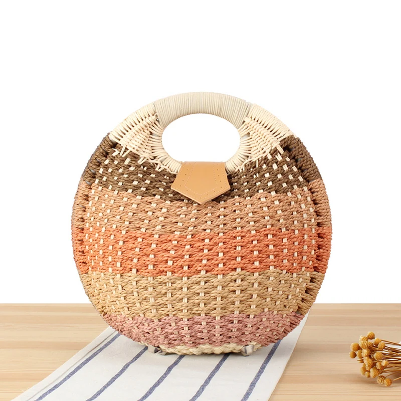 Runde Strohtasche mit elegantem Ledergriff Skanto