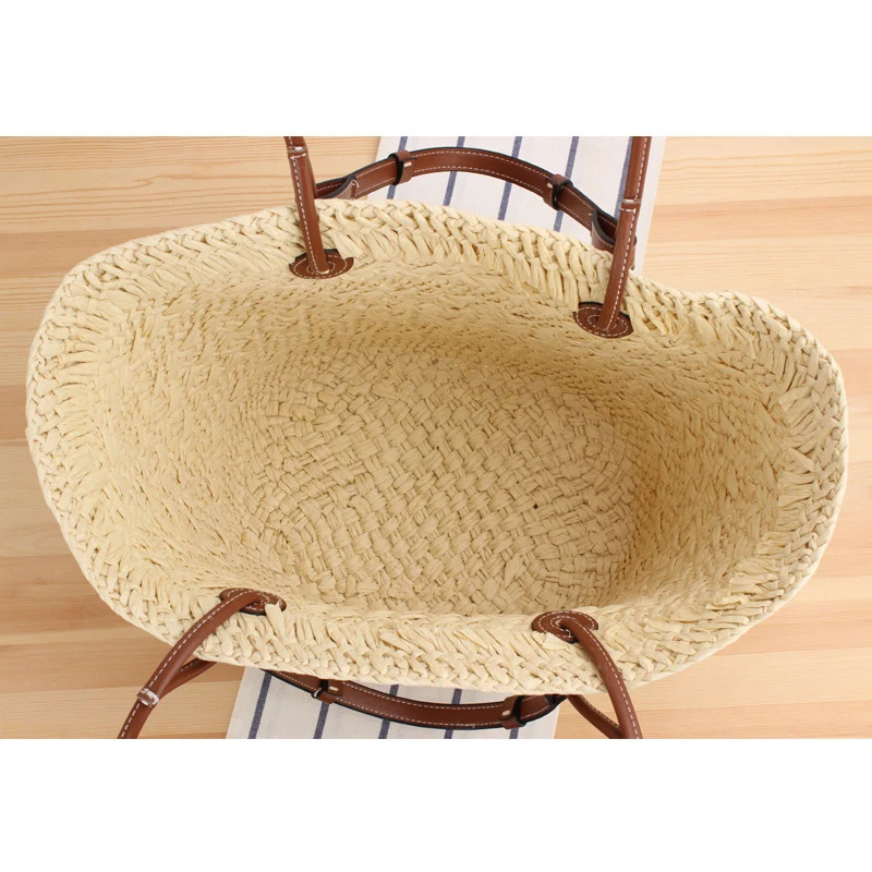 Geflochtene Strandtasche mit eleganten Ledergriffen Skanto
