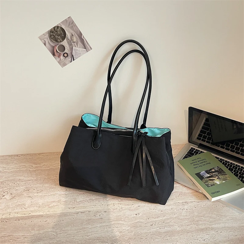 Elegante Handtasche mit Reißverschluss und praktischen Innentaschen Skanto