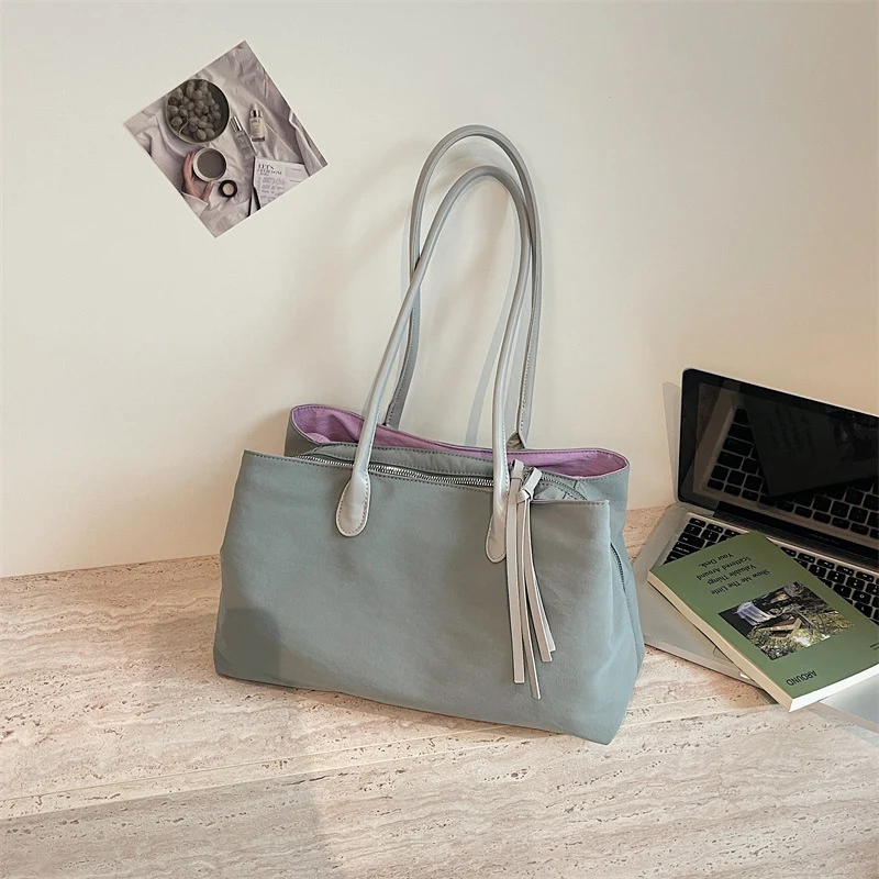 Elegante Handtasche mit Reißverschluss und praktischen Innentaschen Skanto
